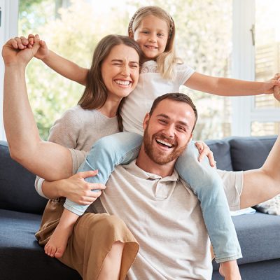Happy family bonding on couch